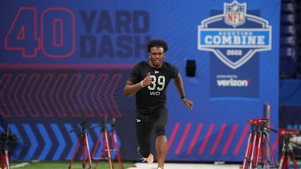 Mar 3, 2022; Indianapolis, IN, USA; Ohio State wide receiver Garrett Wilson (WO39) runs the 40-yard dash during the 2022 NFL Scouting Combine at Lucas Oil Stadium.